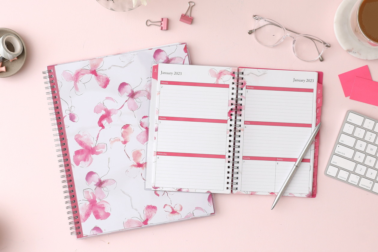 A yearly planner on a desk